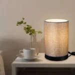 Επιτραπέζιο φωτιστικό Fana pakoworld ύφασμα σε γκρι απόχρωση Φ14x21εκ. κωδ.0060-147-000180